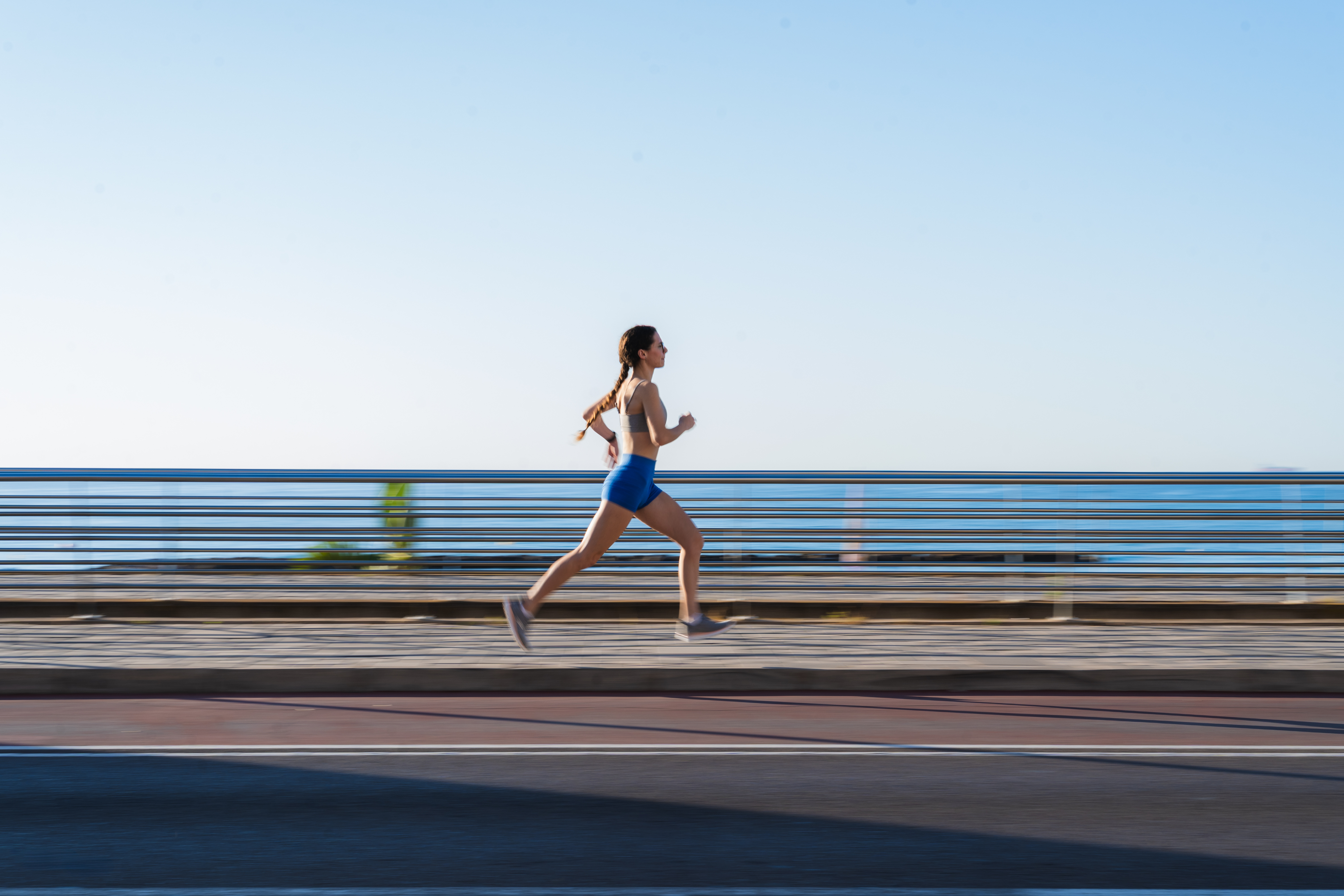 Woman running confidently outdoors